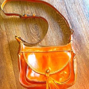 Patricia Nash 💯 leather crossbody/ shoulder bag with leather tassel